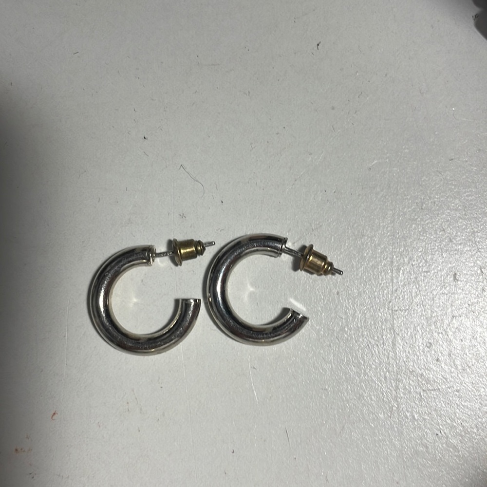 one pair of silver hoops